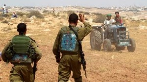 IDF soldaten en Palestijnse boeren
