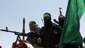 Strijders van de Al-Qassam brigades van Hamas bij de begrafenis van een mede-strijder, juni 2014
